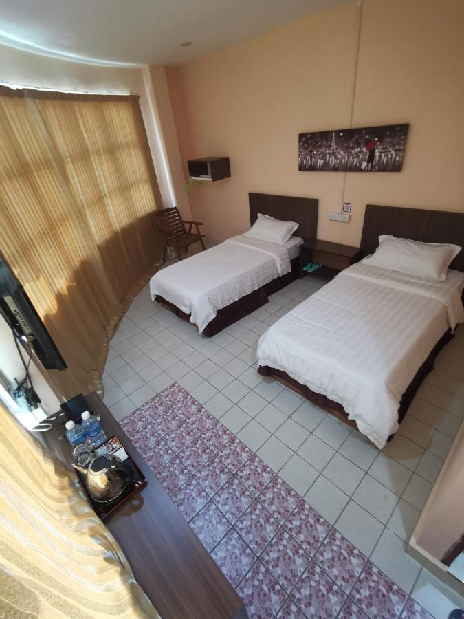 Indah Inn ตาวาอู ภายนอก รูปภาพ